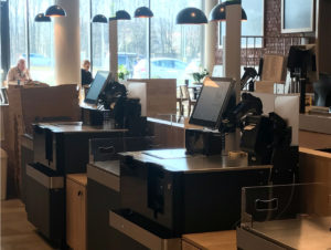 Self-Checkouts dominieren die Kassenzone