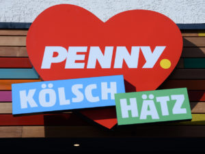 Logo des neugestalteten Penny-Marktes in Köln